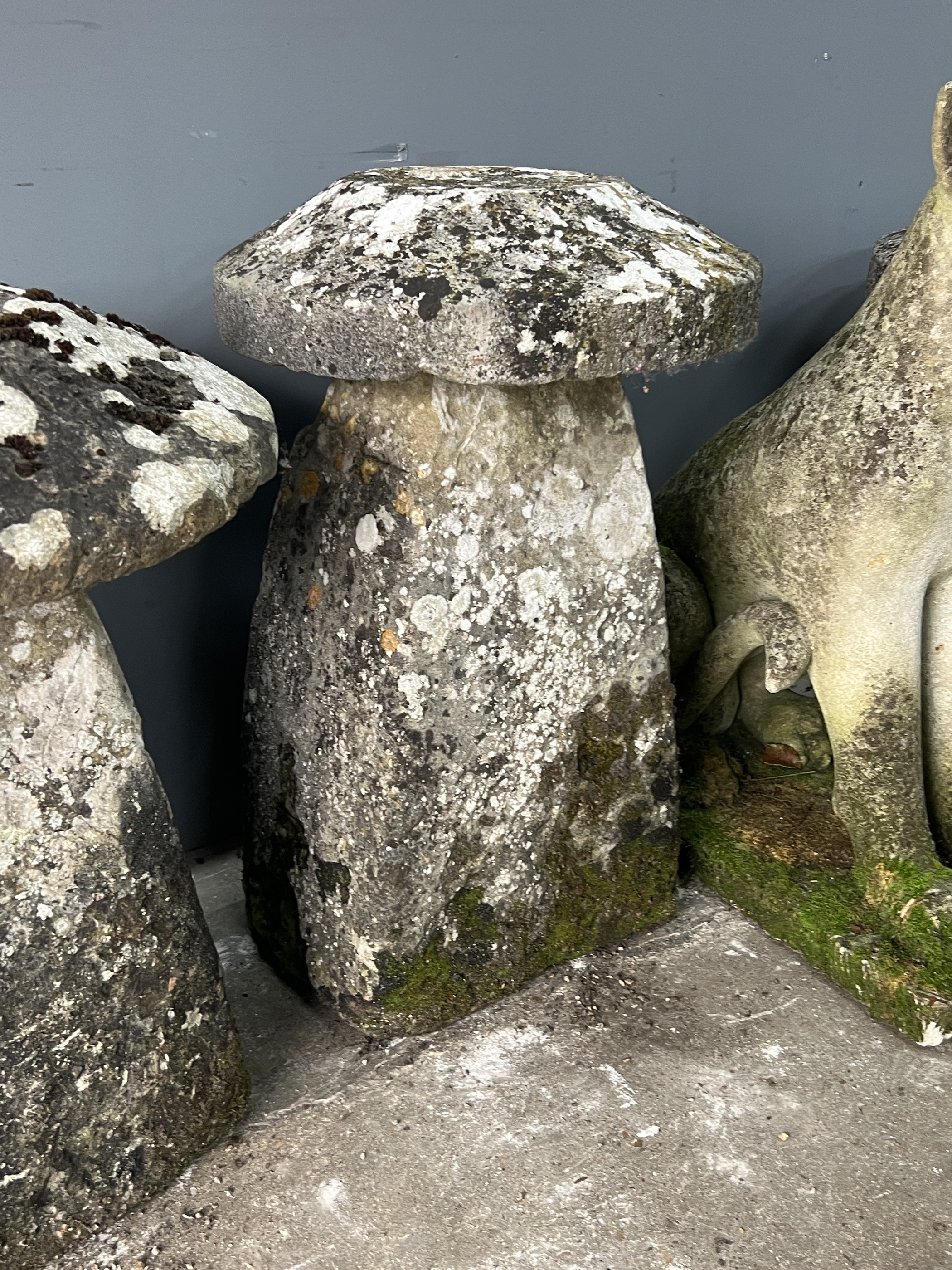 Two natural stone staddle stones, larger diameter 55cm, height 72cm